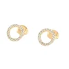 Boucles d'oreilles Agatha Rondou doréescercle ajouré empierré