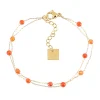 Bracelet Zag Bijoux Hinaku acier doré pierres orange