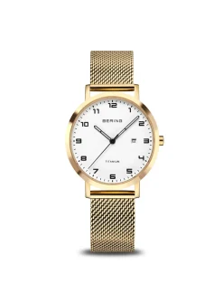Montre femme Bering titanium acier milanais doré