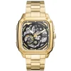Montre Fossil automatique Inscription acier dore